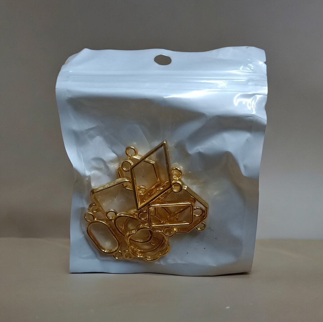 MINI RAKHI BAZEL GOLD BBZG